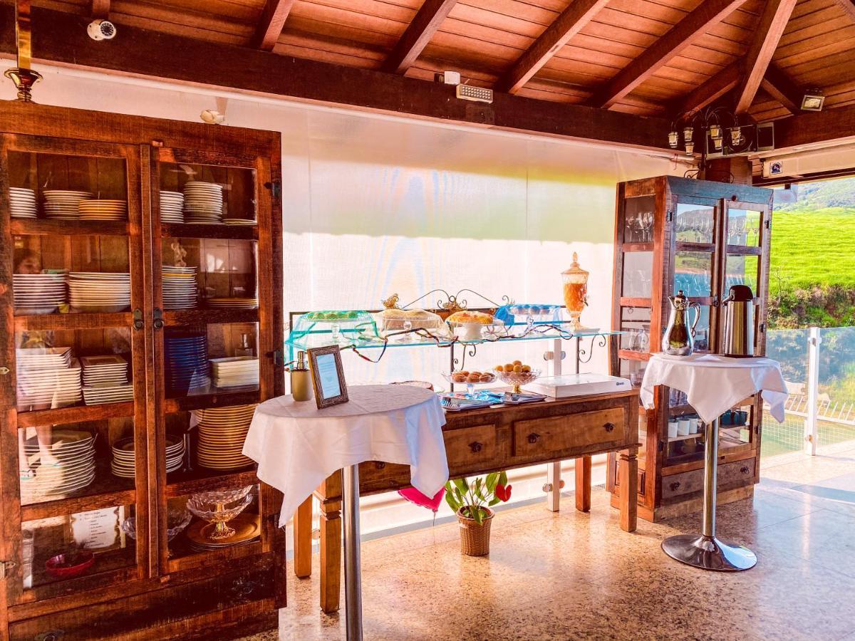 Hotel Boutique Coracao Aberto กาปีตอลิโอ ภายนอก รูปภาพ