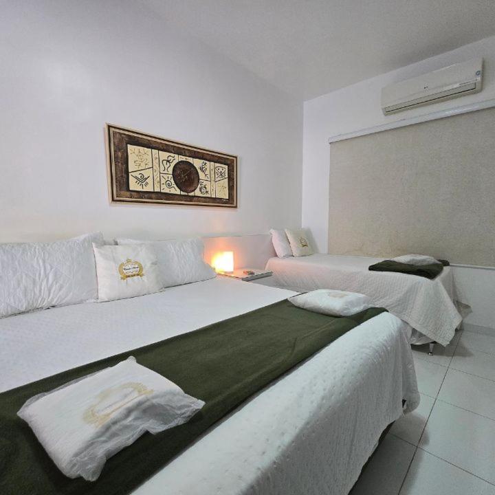 Hotel Boutique Coracao Aberto กาปีตอลิโอ ภายนอก รูปภาพ