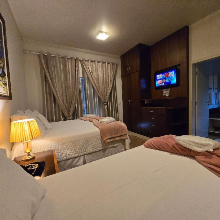Hotel Boutique Coracao Aberto กาปีตอลิโอ ภายนอก รูปภาพ