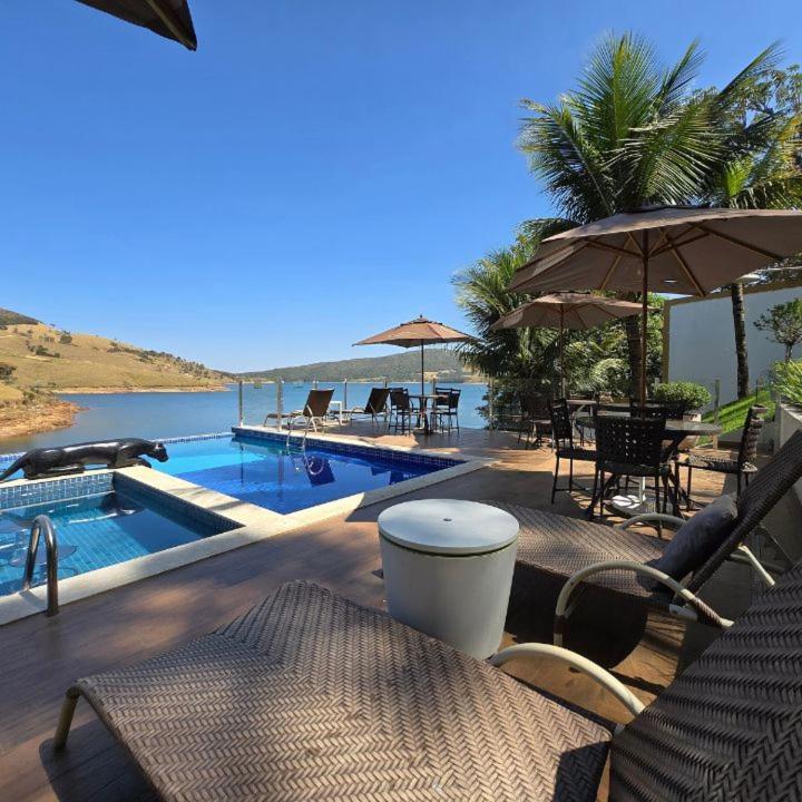 Hotel Boutique Coracao Aberto กาปีตอลิโอ ภายนอก รูปภาพ